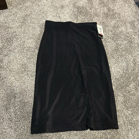 Ing Dresses & Skirts - Black NWT light weight black mid calf skirt